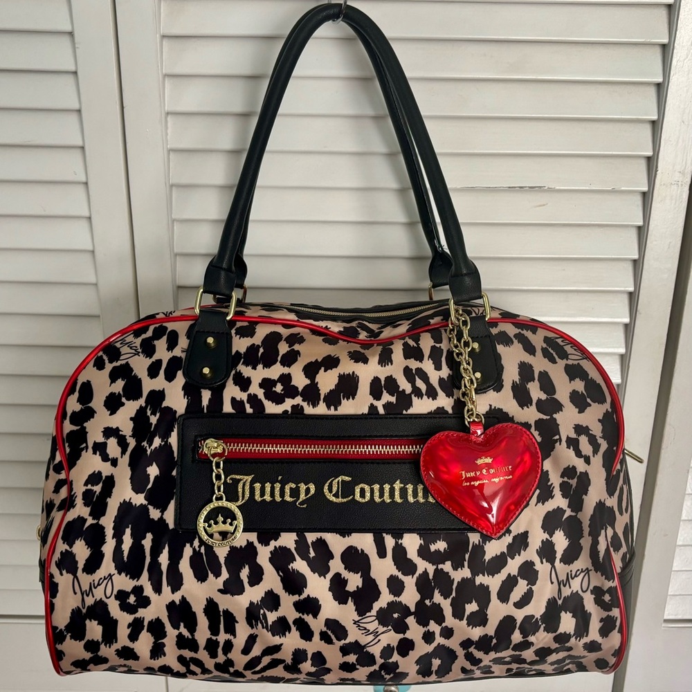 New Juicy Couture Weekender/
15” across, 10” wide 11” high
Outside zipped pocket